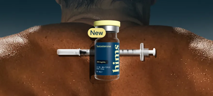 Testosterone injection vial and syringe resting on a man's back